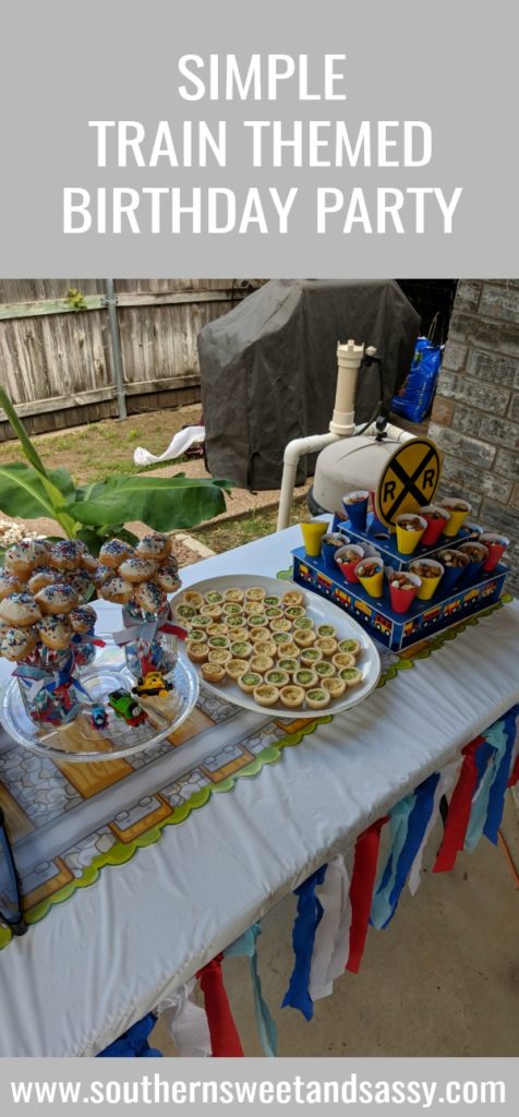 Easy train themed party for a toddler's birthday party... complete with donut hole "cake pops"! 